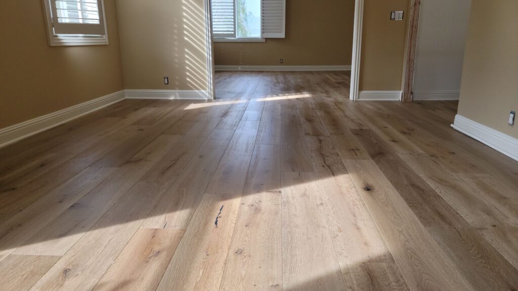 a hardwood floor with a natural wood grain pattern and warm tone
